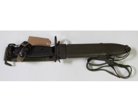 US Army M7 bayonet for the M16 rifle, in an M8/A1 scabbard with original canvas frog. Colt's maker's mark to blade, with seri