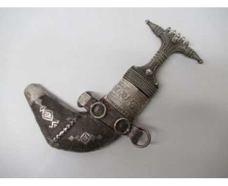Middle Eastern Jambya dagger, 8" curved blade, silver (white metal) mounted hilt with stud design complete with leather and s
