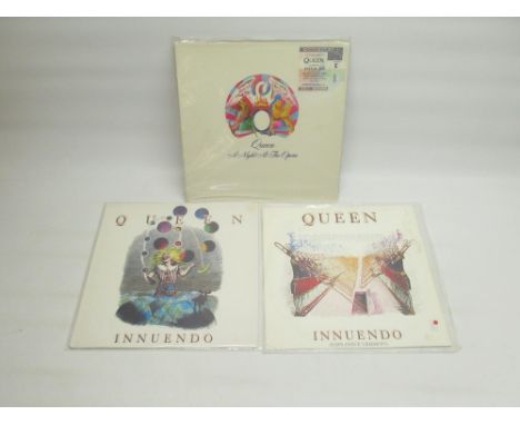 Queen - A Night at the Opera LP, with attached Queen Webley Stadium 11 July 1986 ticket, Innuendo and Innuendo (Explosive Ver
