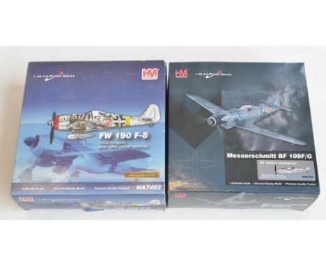 Two 1/48 scale diecast WWII era models from Hobbymaster to include Bf109G-6 Finnish Air Force (mint condition but some sticky