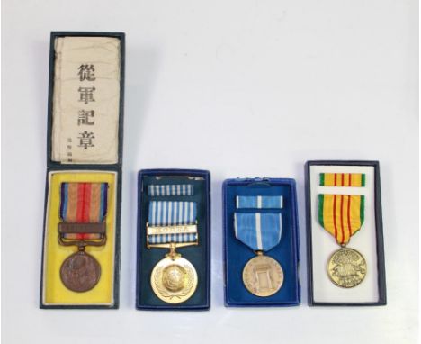 Japan. China Incident War Medal, in original box and papers. U.N. Korea Medal, in original box, U.S.A. Korea service Medal an