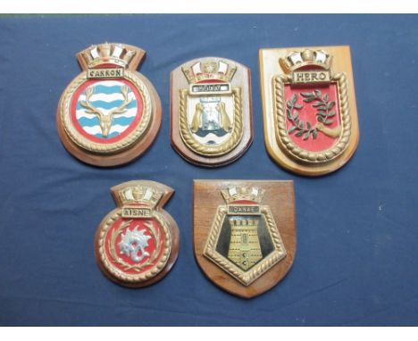 Collection of military and civilian metal and ceramic mounted wall plaques to include H.M.S. Gurkha, H.M.S. Torbay, Carron, P