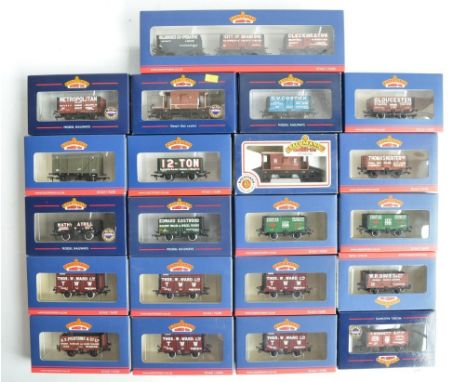 Collection of boxed OO gauge goods wagons from Bachmann to include 20 single wagons and 37-075N set of 3 Northern Co-op priva