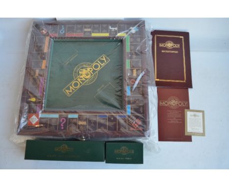 Franklin Mint Collector's Edition Monopoly board game with 22 carat gold plated details and playing pieces, set appears as ne