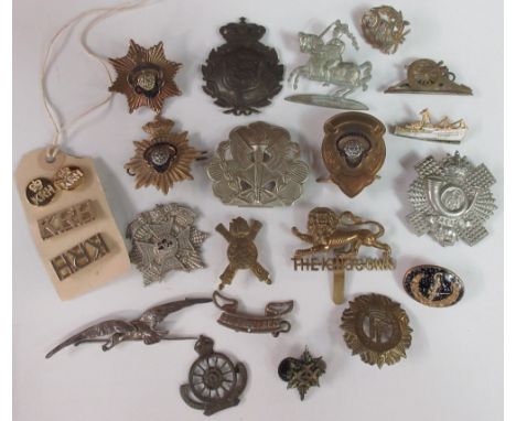 Large collection of military cap and civilian badges, buttons, and pins, including RAF buttons, The Royal British Legion, The