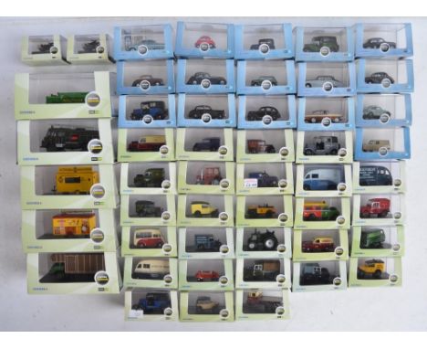 Fifty boxed 1/76 scale (OO gauge) vehicle models from Oxford Diecast's Commercials and Automobile Company range of models, co