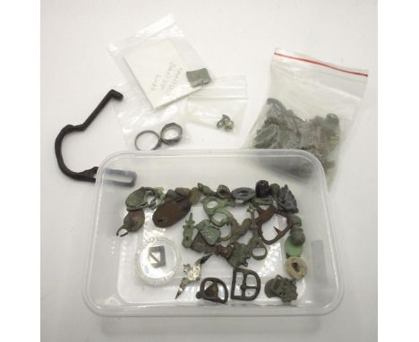 Selection of metal detector finds, including an array of military cap badges, a silver RAF sweetheart broach, a selection of 