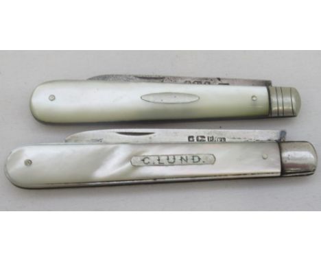 Two Sheffield made hallmarked silver fruit knives, one dated 1894 and one 1954, with pearl handled. Longest blade L2.4''