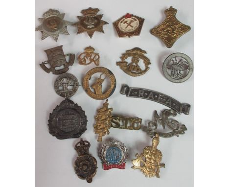 Large collection of military cap badges, buttons, and pins including The Rest Centre Service, The Seamen and Boatman's' Auxil