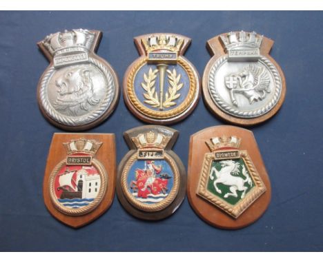 Collection of military and civilian metal and ceramic mounted wall plaques to include H.M.S. Trump, Sheffield, Encore, H.M.S.