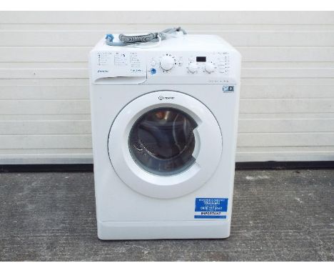 An Indesit Innex washing machine, model BWD71453