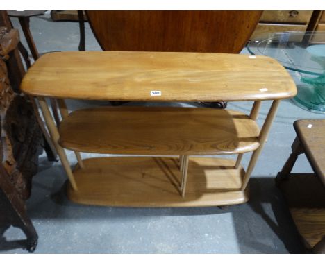An Ercol Three Tier Book Trolley On Casters