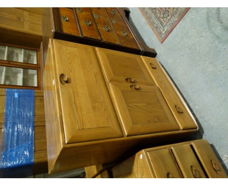 An Ercol Elm Windsor 469 Drinks Cocktail Cabinet