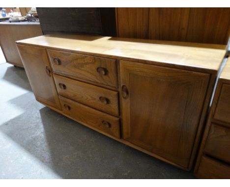An Ercol Windsor Light Elm Large Sideboard Base, 61" Across