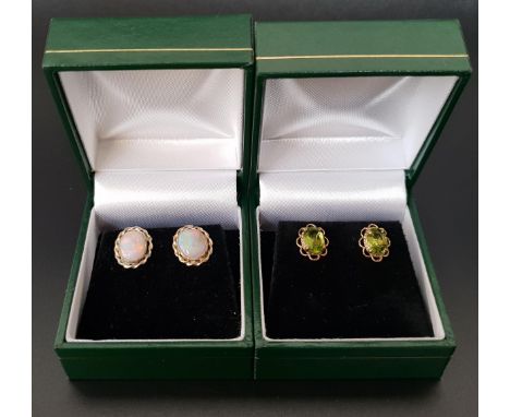 TWO PAIRS OF GEM SET STUD EARRINGSone pair set with opal and the other with peridot 