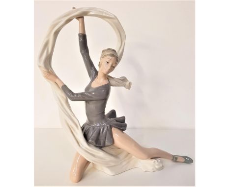 LARGE NAO FIGURINEof a ballerina kneeling with a ring of flowing material, 33cm high 