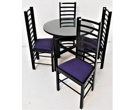 CHARLES RENNIE MACKINTOSH STYLE TABLE AND CHAIRSthe circular table top standing on plain supports with a two tier double stre
