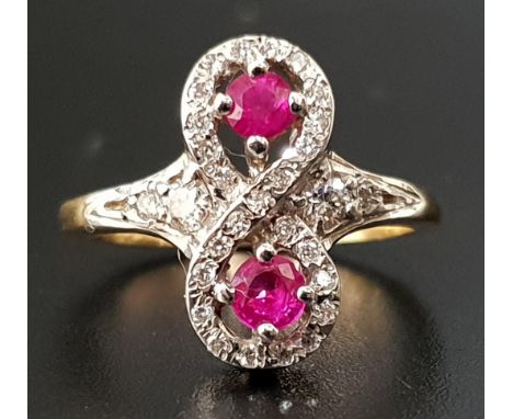 UNUSUAL RUBY AND DIAMOND RINGthe round cut rubies totaling approximately 0.35cts, within multi diamond setting in the form of