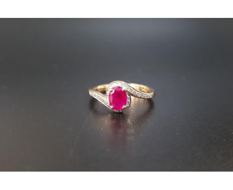 RUBY AND DIAMOND DRESS RINGthe central oval cut ruby approximately 0.8cts flanked by small diamonds, on nine carat gold shank