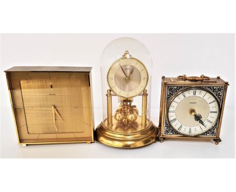 BENTIMA 400 DAY CLOCKthe circular dial with Arabic and baton markers, under a glass dome, Atlantic brass square mantle clock 