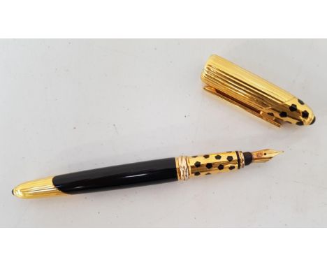 PANTHERE DE CARTIER GOLD PLATED AND ENAMEL FOUNTAIN PENdated 1990 and numbered 051882, with eighteen carat gold nib 
