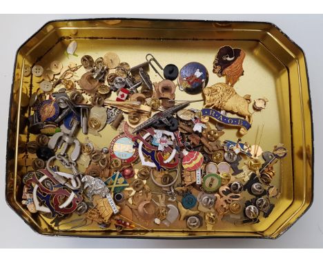 SELECTION OF METAL AND ENAMEL BADGES AND TIE PINSincluding USSR submarine, Captain Hook, Rupert the Bear, Hagar the Horrible,