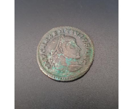 MAXENTIUS (AD 306-312) BRONZE FOLLISobverse: Laureate head of Mexentius facing right, IMP C MAXENTIVS P F AVG; reverse: Hexas