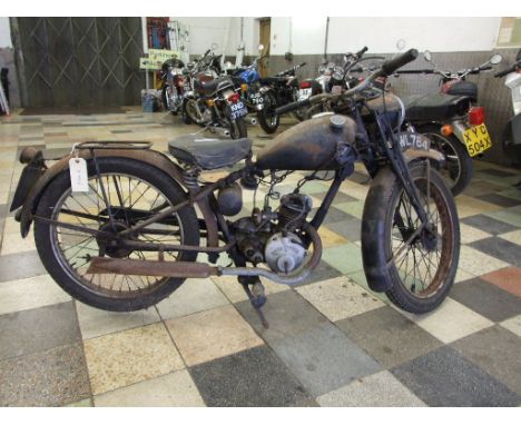 A 1947 Royal Enfield 125cc, registration number MWL 784, black. This Royal Enfield would appear complete and has a spare engi