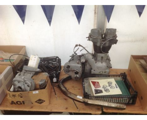 A good selection of Royal Enfield spares and accessories, including a 350cc Bullet engine and gearbox, a complete clutch and 