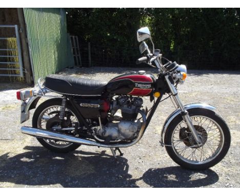 A 1976 Triumph Bonneville 750, registration number NRY 908P, frame number CN68554, engine number PP78605, black and red. This