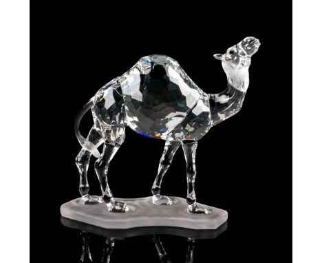 Lead crystal made with a frosted crystal base and jet crystal eyes. Swarovski etched backstamp. This item has its original bo