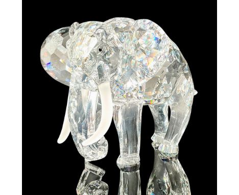 From the Inspiration Africa collection. Faceted crystal figurine modeled as an African elephant with large ears and frosted c