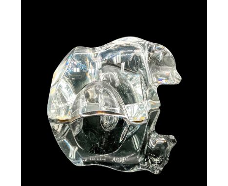 A small, clear figure of a bear cub. Baccarat marked. This item has its original box: 6.25"L x 5.75"W x 3.5"H. Dimensions: 4.