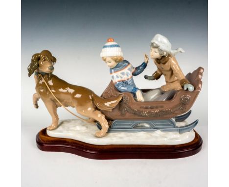 Large glossy finish; Lladro backstamp. This item has a base included. Base measures: 18"L x 6.75"W x 1"H. Artist: Salvador De