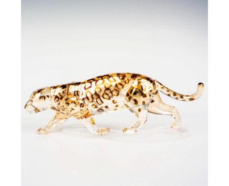 Stunning sculpture gleaming in golden shine crystal with accents in crystal satin and stands on a matt clear crystal base. Sw