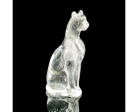 A clear figure of a seated feline. Baccarat marked. This item has its original box: 8.25"L x 7.5"W x 3"H. Dimensions: 3.5"L x