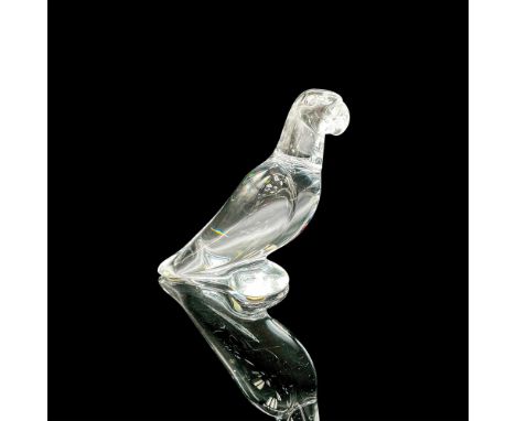 Clear figure of a resting parrot. Baccarat marked. This item has its original box: 8.75"L x 3.5"W x 3"H. Dimensions: 4.25"L x