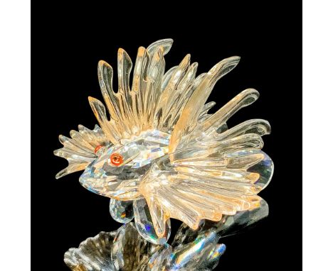 This retired Swarovski crystal lion fish was part of the South Sea theme. The piece is made from clear crystal and has very l