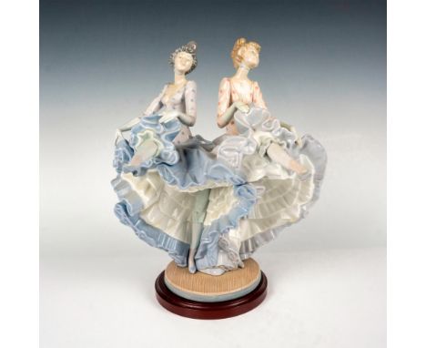 Glossy finish; two dancers lifting their skirts dancing the Can-Can. Lladro backstamp. This item has a base included. Base me