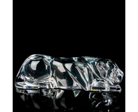 A large, clear figure of a wild cat resting. Baccarat marked. This item has its original box: 11.75"L x 5"W x 4.75"H. Dimensi