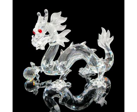 Part of the Annual Edition 1997 Fabulous Creatures. Clear faceted figural holding crystal ball with red crystal eyes and fros