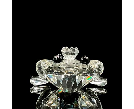Clear crystal with black crystal embellishments and crown. Swarovski backstamp. This item has its original box. Box measures:
