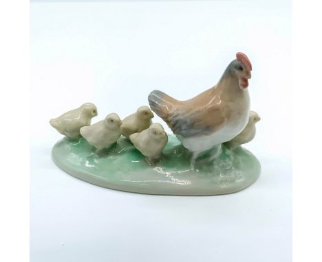 Hen with five baby chicks. Glossy finish; Nao by Lladro backstamp on bottom. Issued: 20th c.Dimensions: 4.75"L x 2.25"W x 3"H