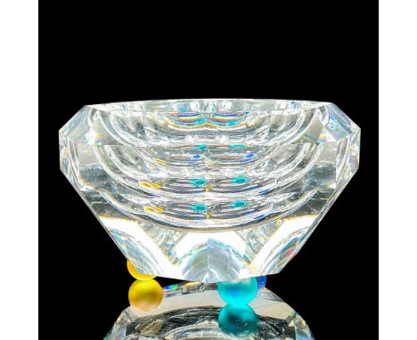 Lead crystal part of the Selection collection and is made with three different colored feet. Swarovski etched backstamp. This