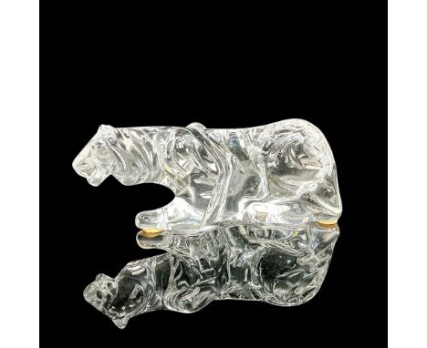 A small, clear figure of a jungle cat crouching. Baccarat marked. This item has its original box: 7.75"L x 3"W x 2.75"H. Dime