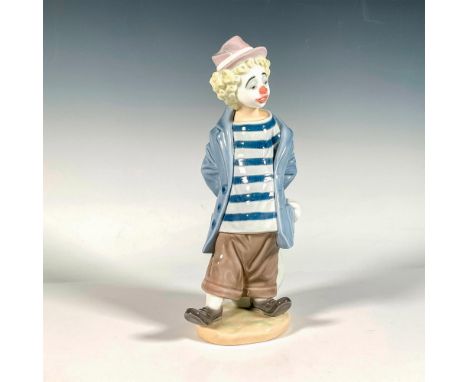 Glossy finish; Lladro backstamp. This item has its original box. Box measures: 12.5"L x 7.5"W x 6"H. Artist: Juan HuertaIssue