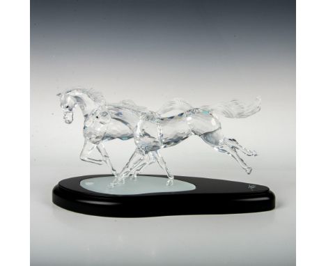 Limited edition sculpture. The Wild Horses were made from clear crystal, with matt manes and tails. The horses are displayed 