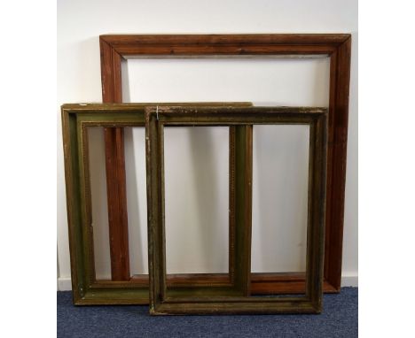 A group of three vintage picture frames, including a larger plain pine example and two gilt and green painted frames, AF (3) 