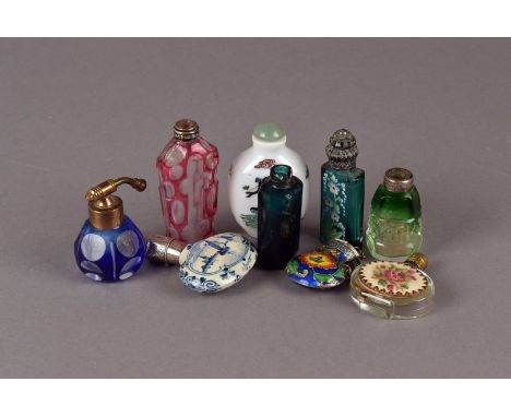 A small group of vintage perfume bottles, including pottery, porcelain, and cut glass examples (7) 