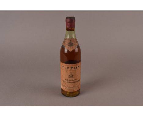 A vintage half bottle of Tiffon Cognac, sold as a work of art, unopened but level on shoulders 